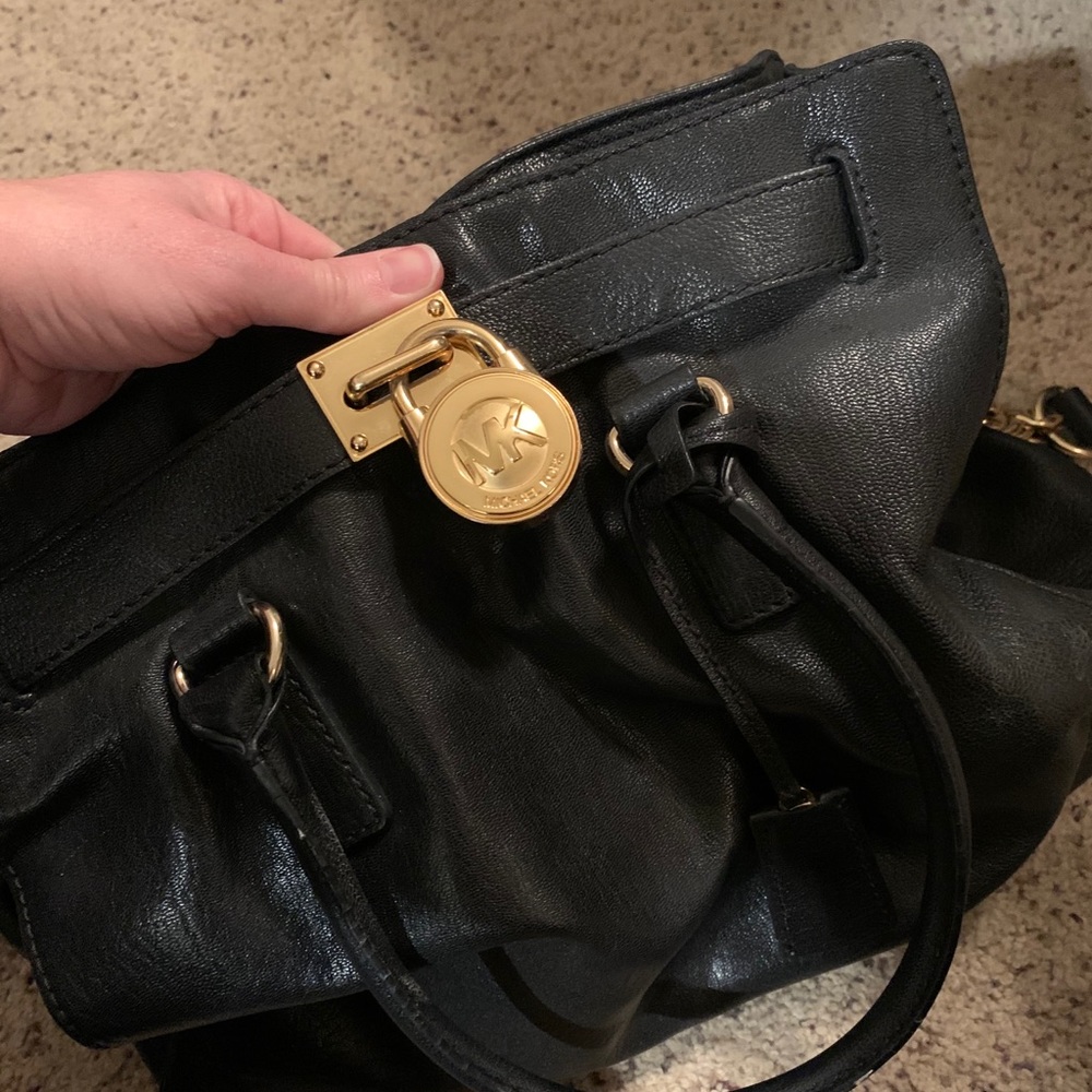 Michael’s black handbag